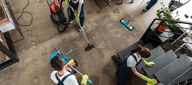 Cleaner with supplies using Squeegee to manage their business